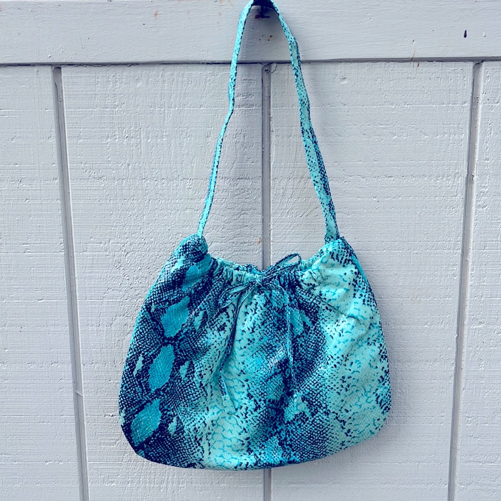 Be Dazzling snake print handbag